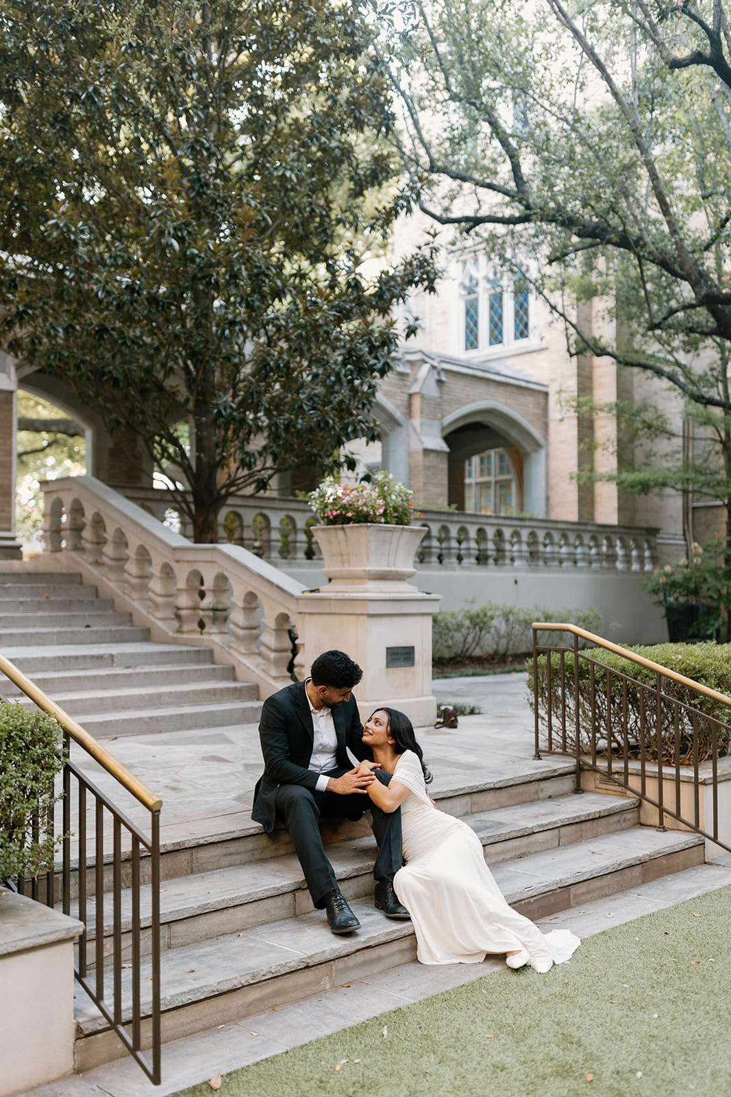 Angela and Ben sitting together on the garden staircase